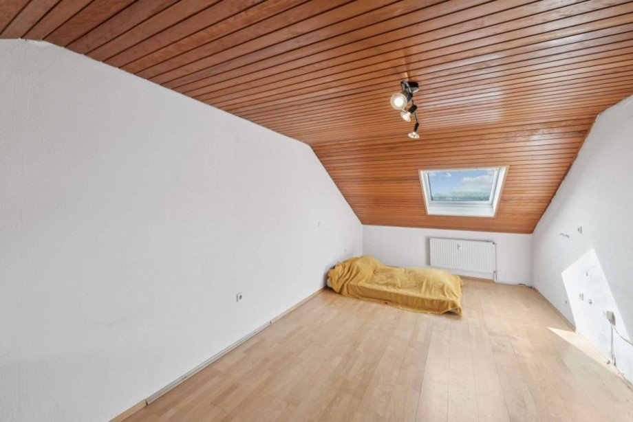 Raum DG Mehrfamilienhaus Ladenburg