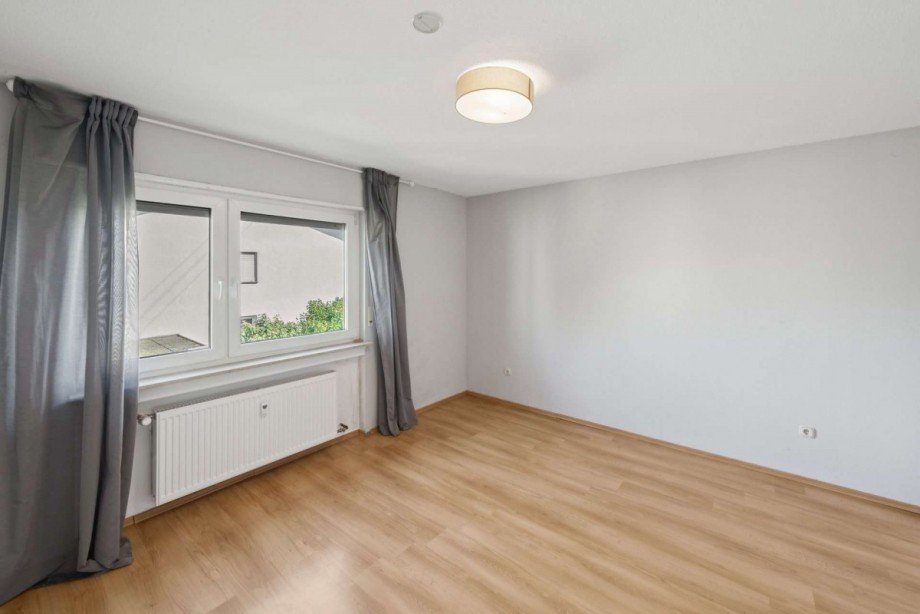 Schlafzimmer 1. OG Mehrfamilienhaus Ladenburg