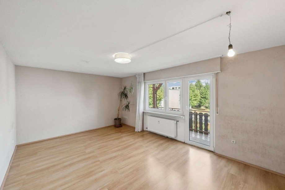 Wohnzimmer 1. OG Mehrfamilienhaus Ladenburg